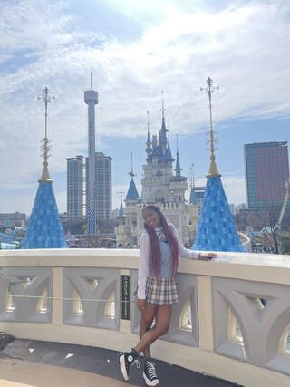 Photo of the author, Kristie, in front of Lotte Worlds iconic Castle