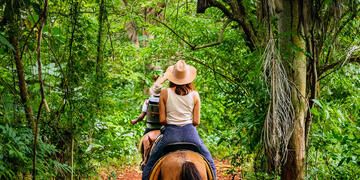 santiago-dr-woman-horseback-forest