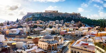athens-snow-dusted-rooftops-acropolis-background