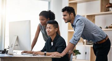 Interns on computer