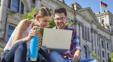 berlin study abroad students researching laptop