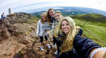 Glasgow girls on cliff taking a selfie together