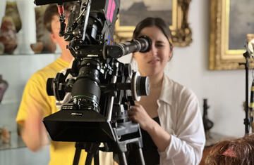 intern abroad filming behind camera