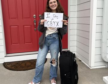 Standing in front of my house before leaving for the airport