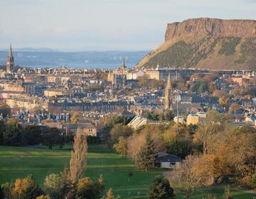 An image of Athurs Seat in the distance 
