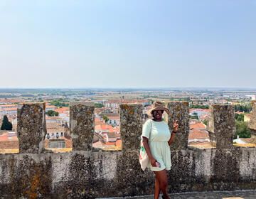 Student on a stone wall