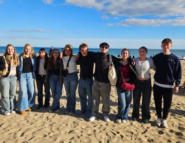 High school students in Alicante posing on beach