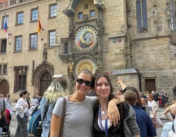Two HSSA students next to the Astromical Clock