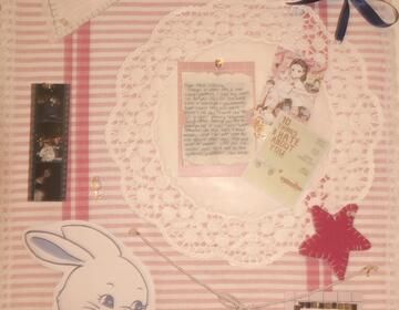 Hanna decorated a corkboard with pink fabric.