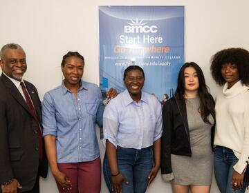 Dr. Anthony E. Munroe, President, Borough of Manhattan Community College with BMCC Students