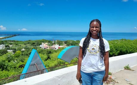 yucatan-student-overlooking-forested-area