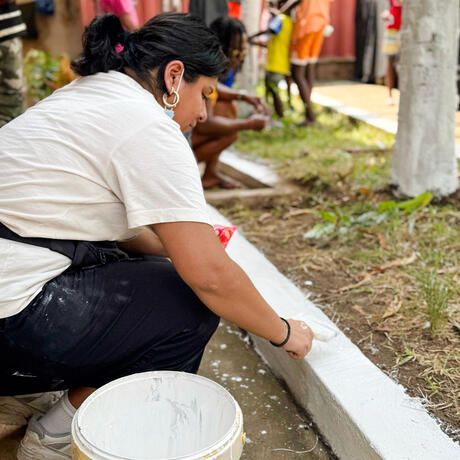 legon-woman-painting-service-learning