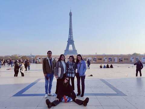 Gap students posing in front of the Eiffel Tower