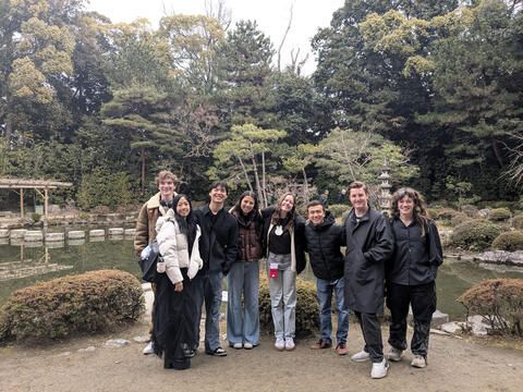 high school students posing in garden in Kyoto