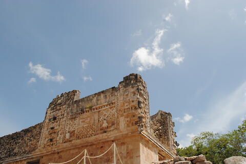 The carvings of Chac seen on one of the ancient buildings of Uxmal