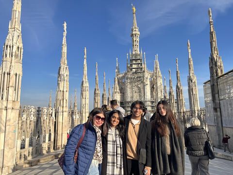 Students posing in front of Milan cathedral
