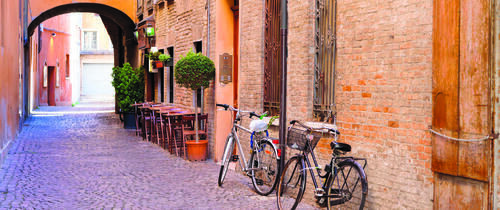 Bicycles in an alley in Ferrara, Italy