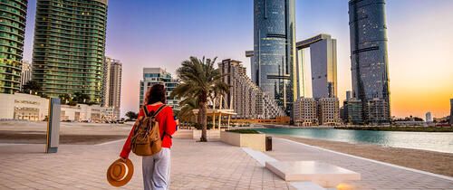 abu-dhabi-woman-backpack-walking-reem-island