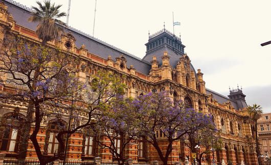 government building in buenos aires flowers flag