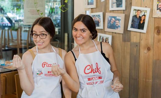 High school girls in a cooking class in Rome