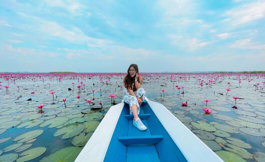 student on boat in Thailand.jpg