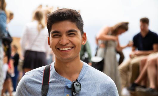 Seville student smiling during a visit to the gardens of the Alhambra