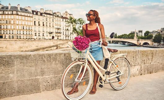 girl biking abroad paris france