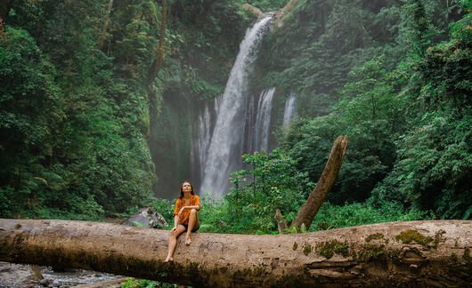 monteverde_woman-sitting-by-water-fall-monteverde-costa-rica.jpg