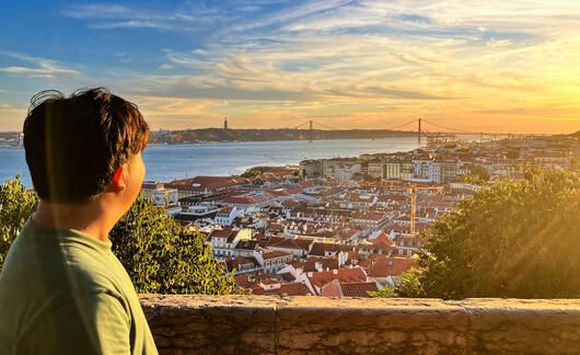 lisbon-student-looking-over-city-during-sunset