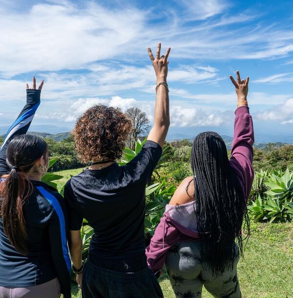 monteverde-girls-arms-up.jpg
