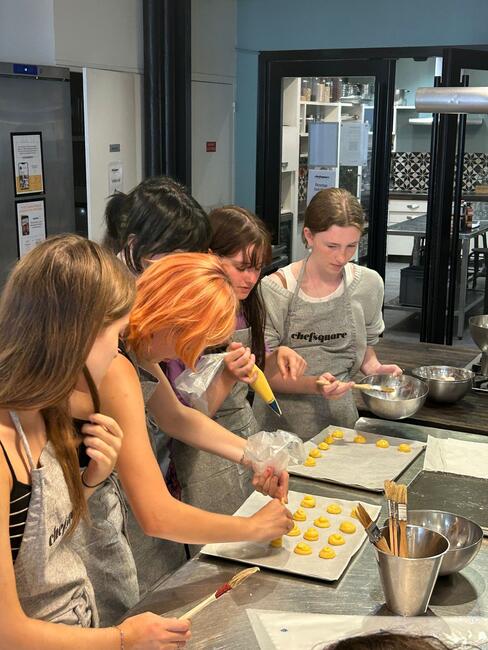 Pouring the paste on the tray to place them in the oven