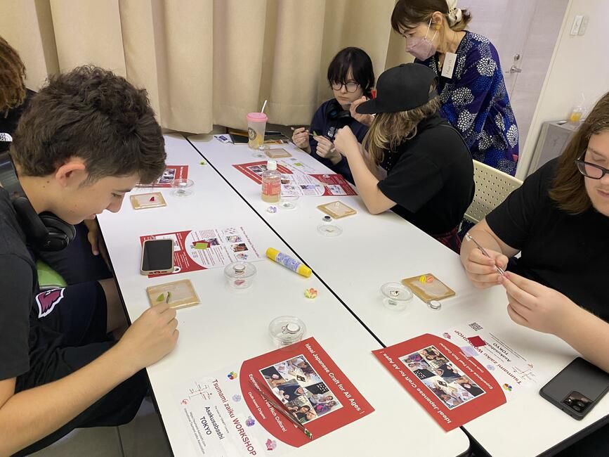Students working on their Tsumami-Zaiku flowers