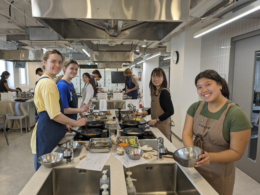 CIEE students cook bibimbap (mixed rice) at a local cooking school