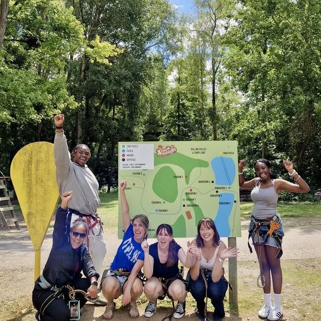 Students and PL celebrate finishing the Accrobranche activity