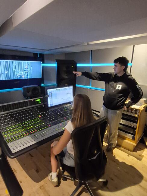One of the students learning how to mix a song