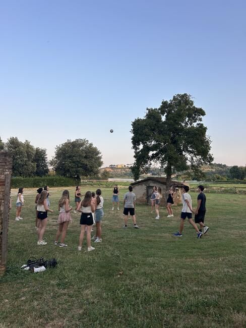 Students playing volleyball in Florence