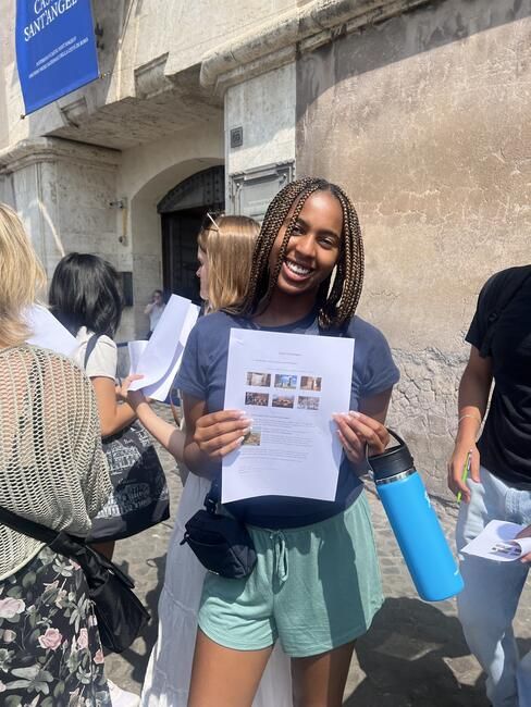 Student with assignment ready to tour the Castel!