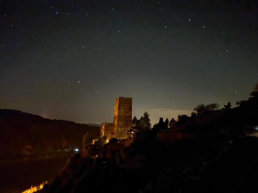 A view of the castle at night
