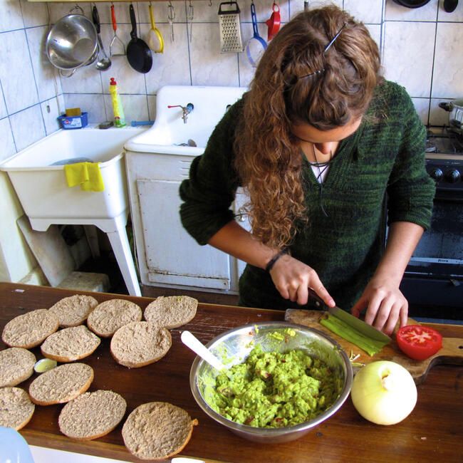 santiago ch student making guacamole sandwiches