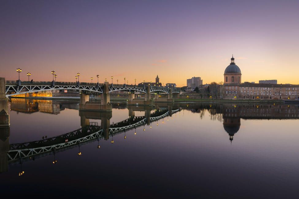 toulouse river and bridge at twilight