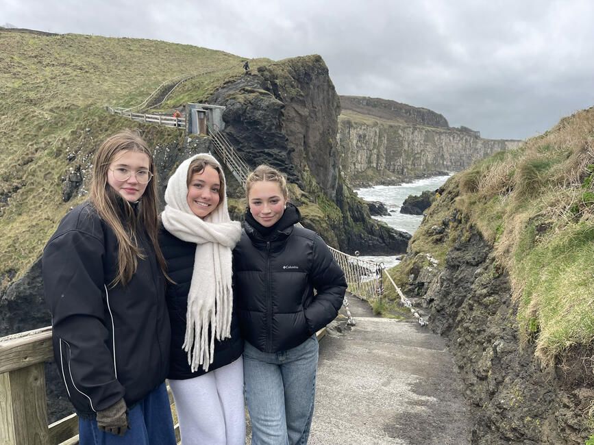 High school students on a bridge in the mountains of Ireland