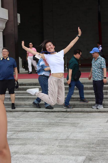 taipei_student-in-taiwan-jumping-and-smiling.JPG