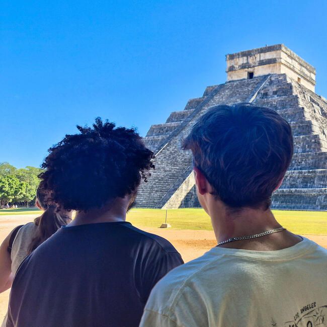 merida-two-guys-looking-chichen-itza