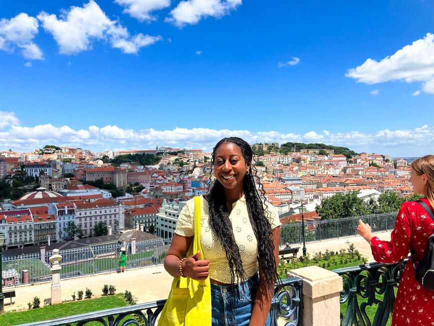 lisbon-student-posing-city-skyline-view