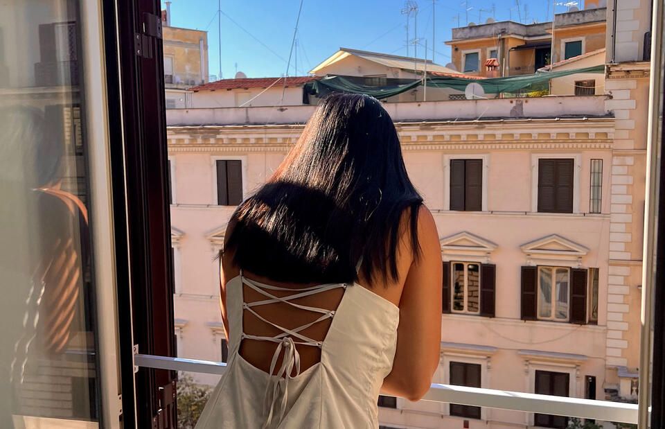 student rome overlooking city street