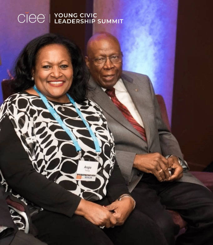 An older Black couple sit side-by-side, its Ambassador Young and his wife Angie Young