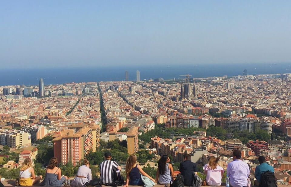 barcelona city overlook view students sitting
