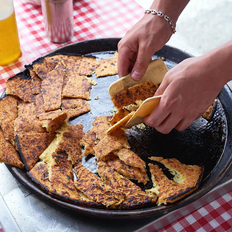 nice-meals-hands-breaking-socca