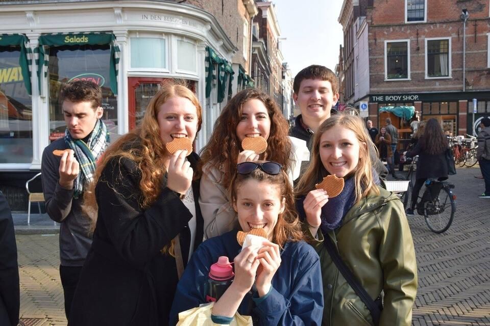 CIEE Brussels students eating waffles in street